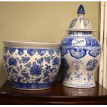 Late 20th Century blue and white decorated Oriental vase and cover and a similar goldfish bowl/