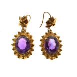 Pair of 9ct gold drop earrings set amethyst coloured stones Condition: