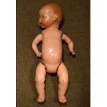 Vintage Armand Marseille sprayed bisque head doll having a composition body Condition: