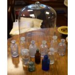 Large glass cloche, together with a small collection of glass pharmacist's jars etc Condition:
