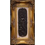 Bronzed relief plaque decorated with an angel and cherub, framed Condition: