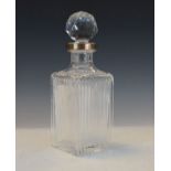 Cut glass square decanter having collar stamped Sterling with faceted stopper Condition: