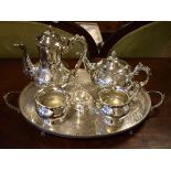 Silver plated four piece tea set with tray and strainer Condition: