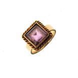 Dress ring set square amethyst coloured stone within a rope twist border, the shank stamped 18ct,