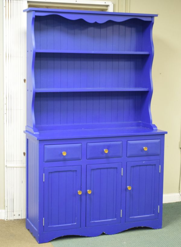 Modern blue painted dresser fitted three drawers over two panelled doors with plate rack over