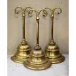 Set of three brass and cast iron doorstops Condition: