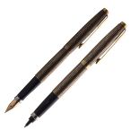 Pens - Parker fountain and matching ballpoint pen, each in an engine turned sterling case Condition: