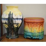 Art pottery vase having landscape decoration, the base unmarked, 26.5cm tall together with a