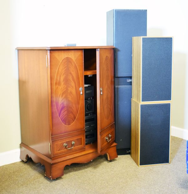 Akai stereo separates system enclosed within a reproduction mahogany two door hi-fi cabinet, with