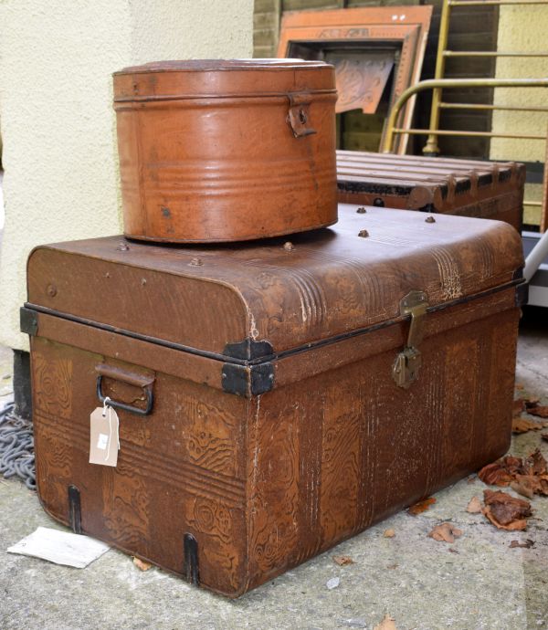 Metal simulated wood tin trunk and oval hat box Condition: