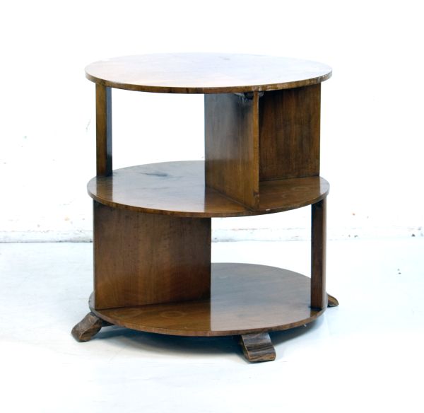 Art Deco walnut circular top three tier table, raised on splayed feet, 61cm diameter Condition: