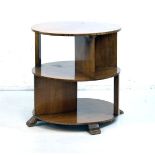 Art Deco walnut circular top three tier table, raised on splayed feet, 61cm diameter Condition: