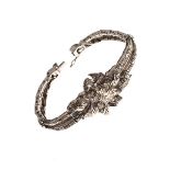 White metal articulated diamond set bracelet, cased Condition: