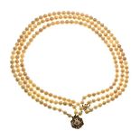 Three row uniform cultured pearl necklace, the sixty-one/sixty-five/sixty-nine pearls of