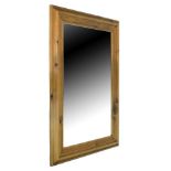 Modern rectangular pine framed mirror, 68cm x 95cm Condition: