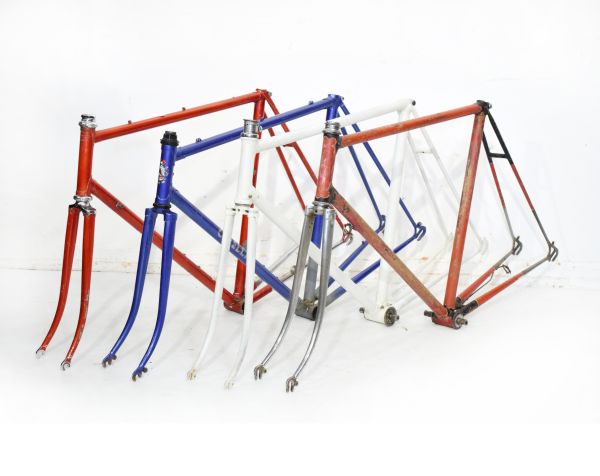 Vintage racing cycle frames comprising: Cinelli Columbus steel tubed frame in purple together with