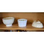 Three pottery white glazed jelly moulds Condition: