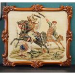 Late 19th Century mahogany framed needlepoint panel depicting two sabre wielding Middle Eastern