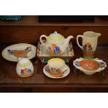 Wilkinson's Clarice Cliff Crocus pattern teapot, honey pot, octagonal jug, tea cup, saucer, dinner