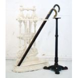 Cast iron stickstand and two walking sticks Condition: