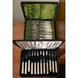 Set of mother-of-pearl handled fruit knives and forks and one other set of fruit knives and forks