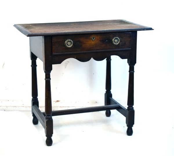 Antique oak low side table fitted one frieze drawer raised on turned supports Condition: