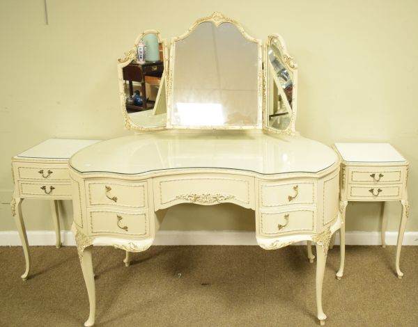 1960's period white painted kidney shaped dressing table with mirror over together with an en-