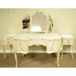 1960's period white painted kidney shaped dressing table with mirror over together with an en-