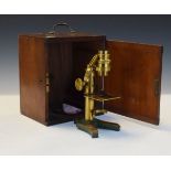 Early 20th Century brass field microscope in mahogany case Condition: