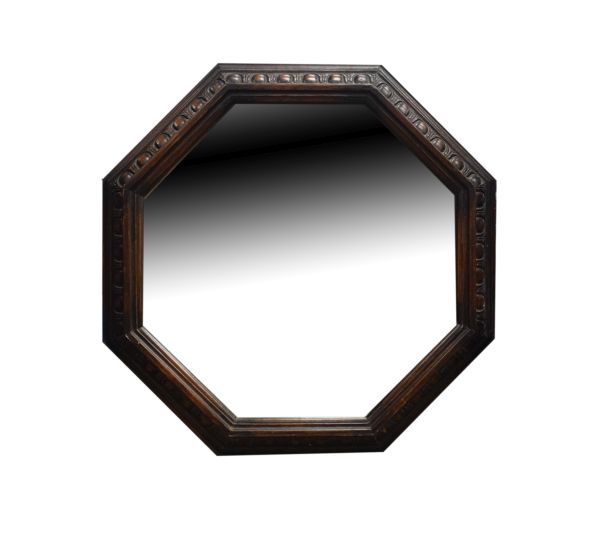 Early 20th Century octagonal carved oak framed mirror Condition: