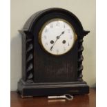 Early 20th Century ebonised mantel clock, the white dial with Arabic numerals Condition: