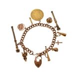9ct gold charm bracelet, attached various charms including a George III spade guinea having a