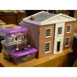 Dolls house in the form of a Georgian townhouse together with a large collection of dolls house