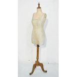 Early 20th Century dressmaker's dummy standing on an oak tripod base Condition: