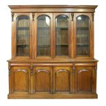 Reproduction Victorian style hardwood two section library bookcase, the upper section fitted moulded