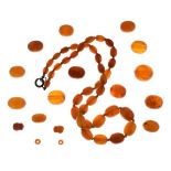 Amber bead necklace, with some loose beads, 41g gross Condition: Necklace having thirty-eight beads,