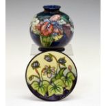 Modern Moorcroft 'Iris' globular vase, 10.5cm high, together with an 'Ashwood Hepatica' pin dish,