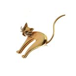 18ct gold cat brooch, with emerald eyes, white gold whiskers, 2.5cm across, 10.5g gross Condition: