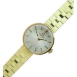 Omega - Lady's 18ct gold mechanical bracelet watch, the circular white dial with gilt batons and