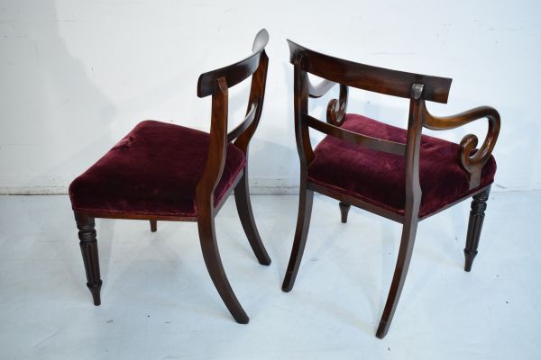 Set of eight William IV mahogany yoke back dining chairs, the seats upholstered in deep red plush - Image 3 of 7
