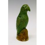 Small Chinese green glazed figure of a parrot perched on a rock, 7.5cm high Condition: Tip of beak