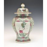 Chinese Famille Rose baluster jar and cover having six foliate reserves on a tight-knit ground