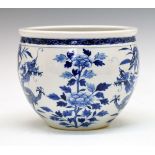 Chinese blue and white jardinière having blue and white decoration depicting dragons amongst