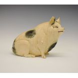 Early 20th Century pottery figure of a seated pig, probably French, 19cm high Condition: Glaze