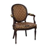 Ewardian Hepplewhite style mahogany framed cameo back open arm elbow chair standing on tapered