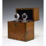 Late 19th/early 20th Century brass bound oak two division decanter box containing a pair of cut