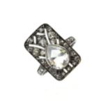 Diamond panel ring, the white mount unmarked, the principal stone is a pendeloque rose cut measuring