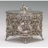 19th Century electroplate oval biscuit barrel, the hinged cover having figural knop formed as a