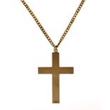Cross pendant, stamped 'C18', on a filed curb link chain, stamped '750', 68cm long, 40g gross