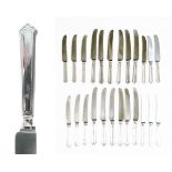 Set of twelve Elizabeth II silver handled Chippendale pattern table knives, together with a set of